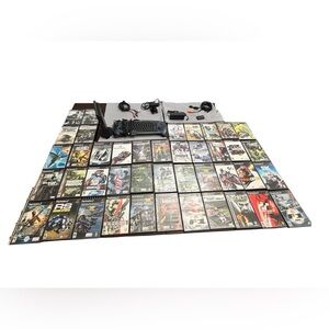 PlayStation Gaming Console Bundle with 42 different Games. Amazing condition